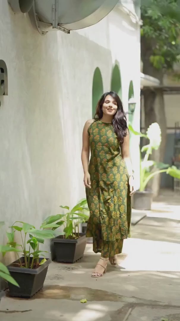 Shreya cotton printed green halter neck A-line kurta pant